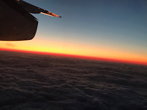 帰りの飛行機からの夕日